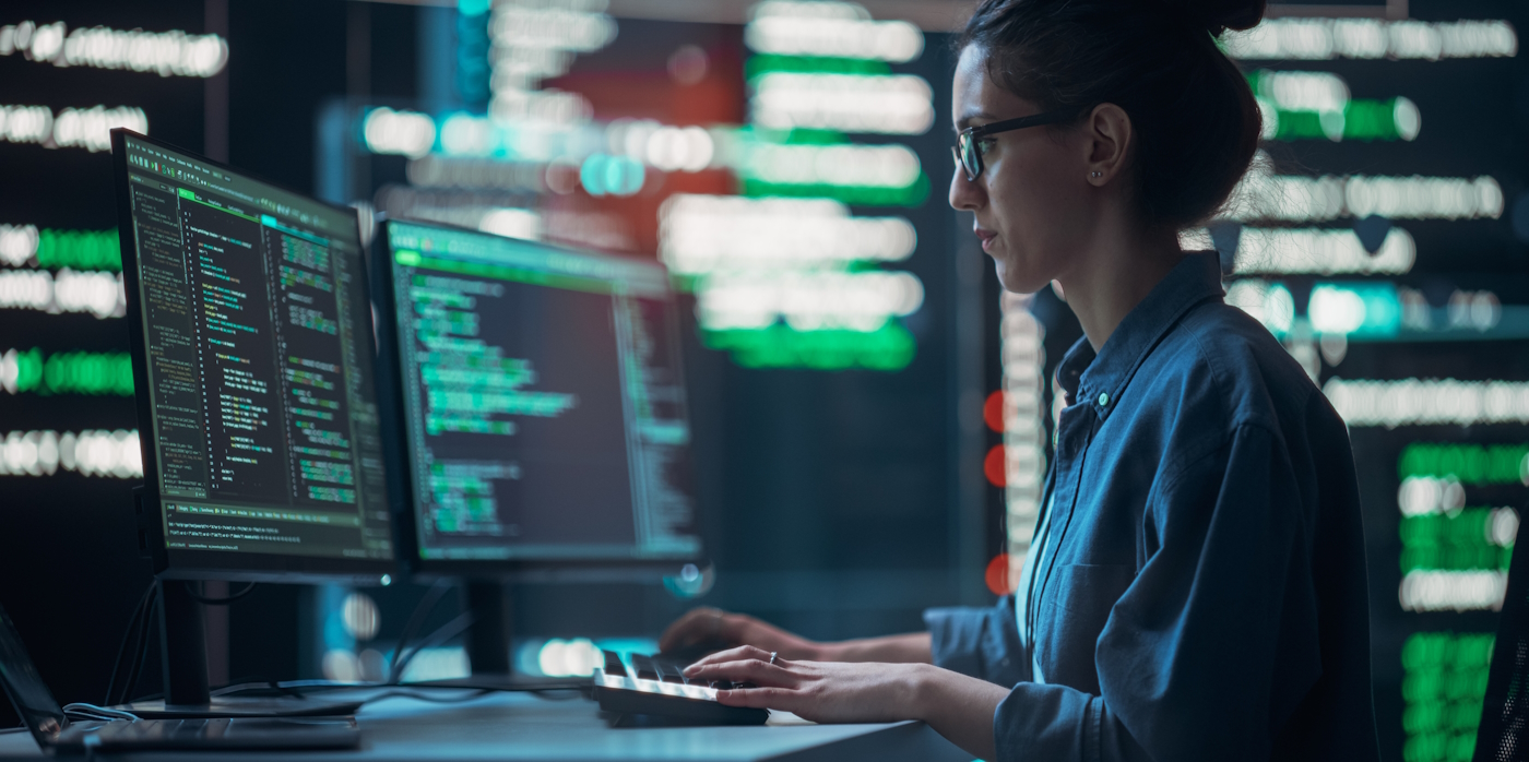 Female Programmer Using Desktop Computer, Analysing Data, Creating AI Software